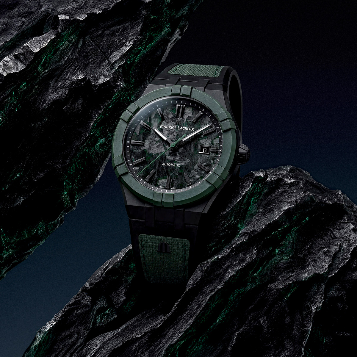 Angled green Frozen Carbon Deep Forest watch against black rocks