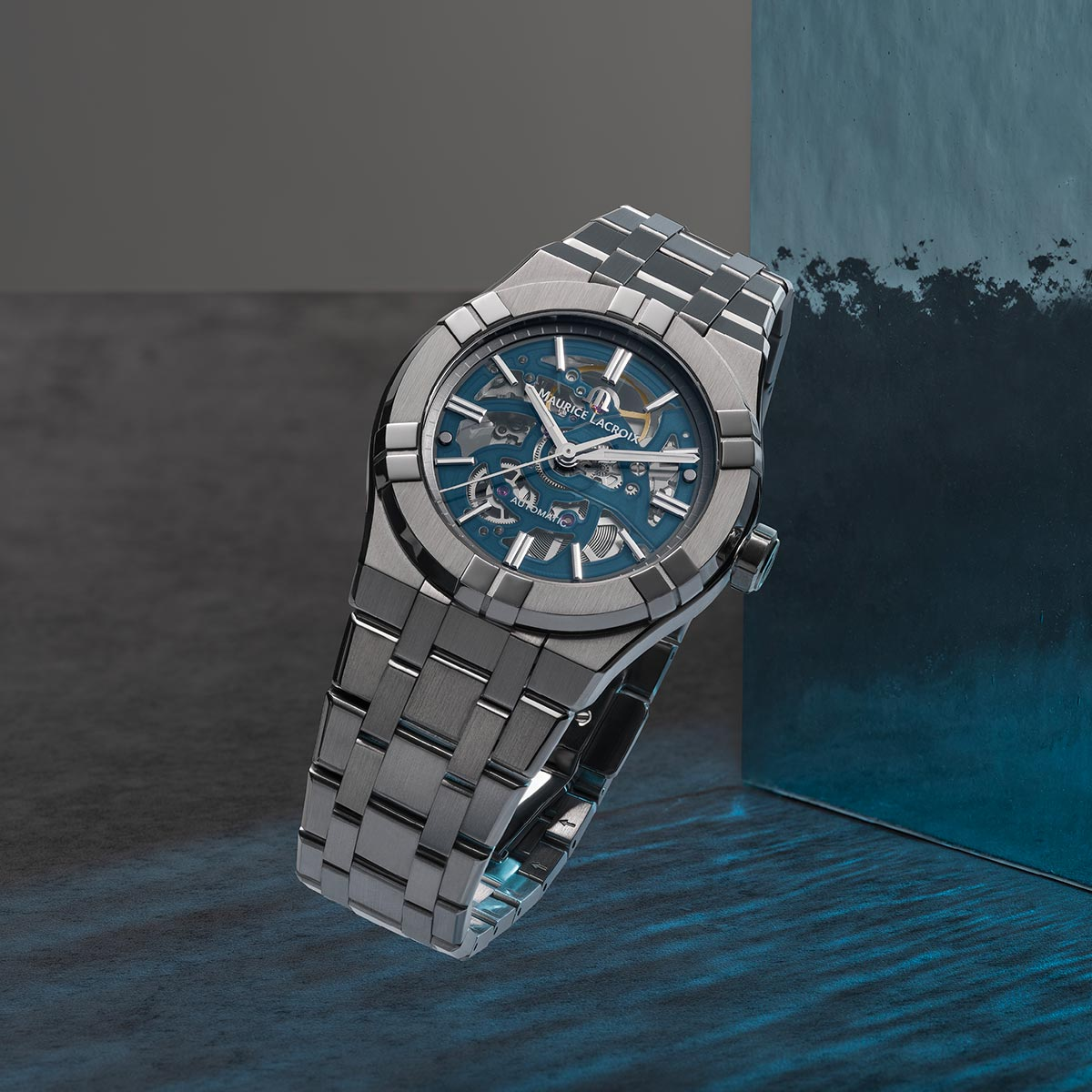 Steel, Skeleton blue, Index rhodied AIKON AUTOMATIC SKELETON