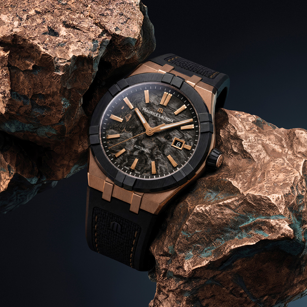 Bronze Frozen Carbon watch against mineral setting with marbled dial